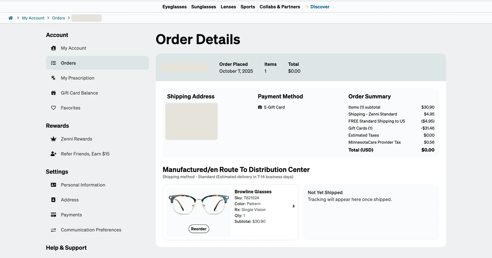 The legacy Order Details page: the heading Manufactured/en Route To Distribution Center, Shipping method Standard, estimated delivery in 7-14 business days, and a Not Yet Shipped panel saying tracking will appear once shipped.